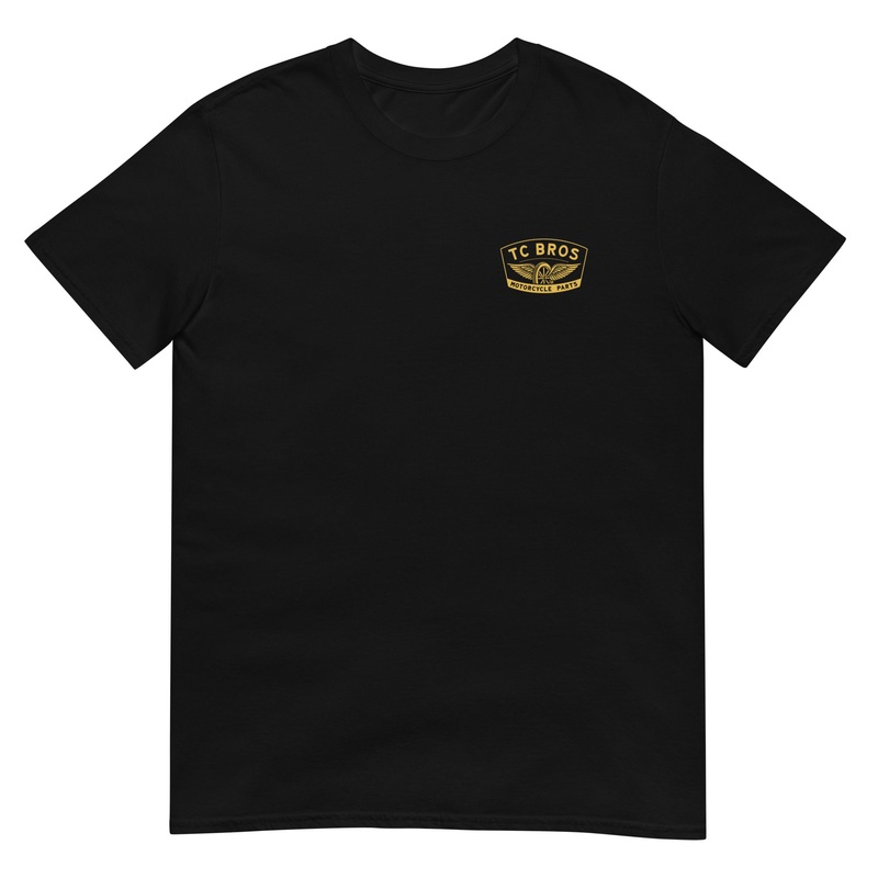 Gold Winged Wheel – Black Tee